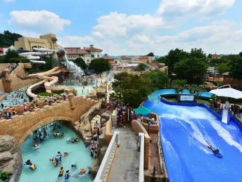 People enjoying the slides at Carribean Bay Water Park in Yongin near Seoul