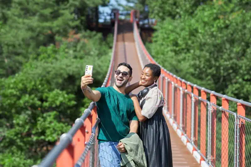 A couple taking Gamaksan- Red Suspension Bridge DMZ Tour