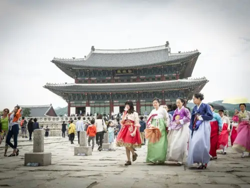 One of our tour groups at Gyeongbok Palace wearing traditional Korean clothes known as Hanbok in Korean