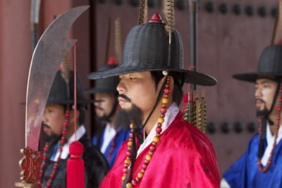 Gyeongbokgung royal palace guards performing their duty during the changing of the guard ceremony