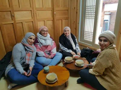 Four ladies take a rest inside a traditional hanok style tea house