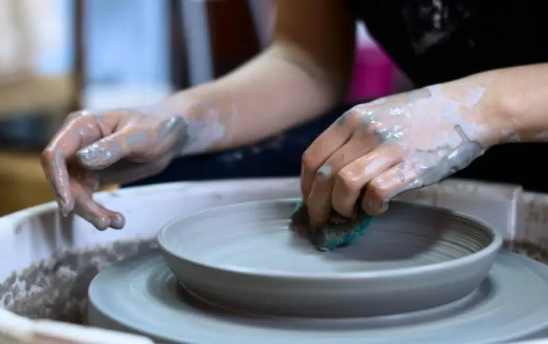 Watching someone demonstrate making pottery at a class