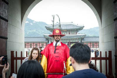 Taking a picture with a Gyeongbokgung Palace guard