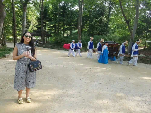 Watching traditional style royal transport at the Korean Folk Village in Yongin