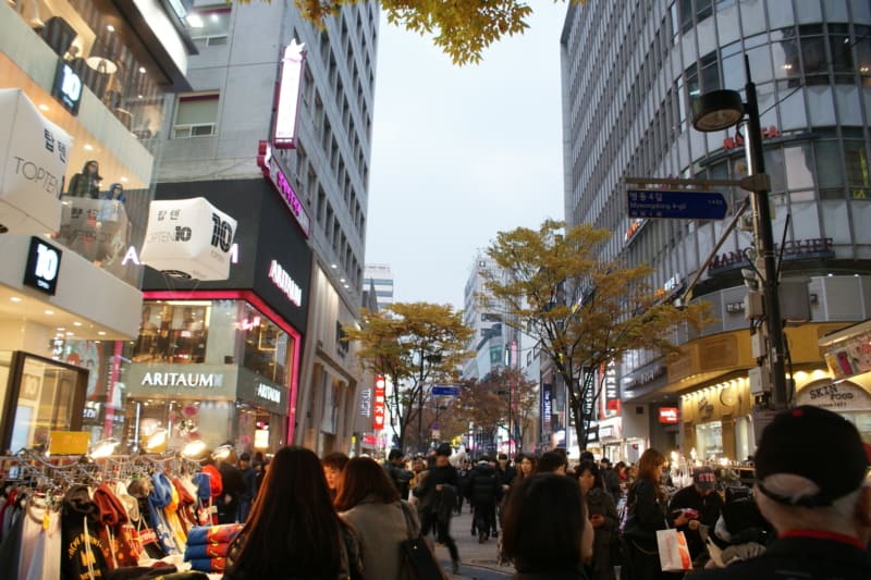 People shopping at Myeongdong shopping street in Seoul