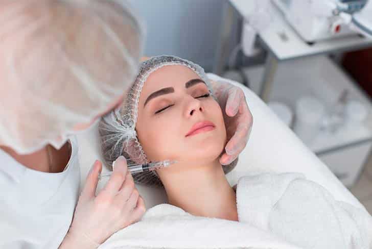 A patient receiving botox injections