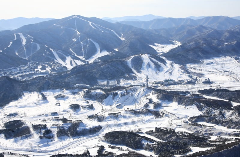 An aerial view of Alpensia Ski Resort covered in snow