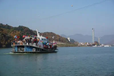 The Nami Island ferry full of passengers in the middle of the Han River