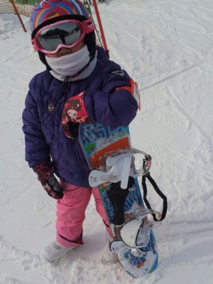 Someone having fun snowboarding in Korea