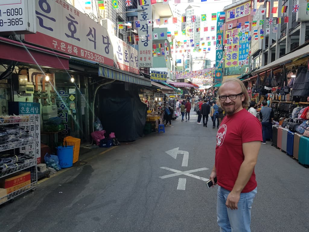 Takign a photo at one of the entrances to Namdaemun Market