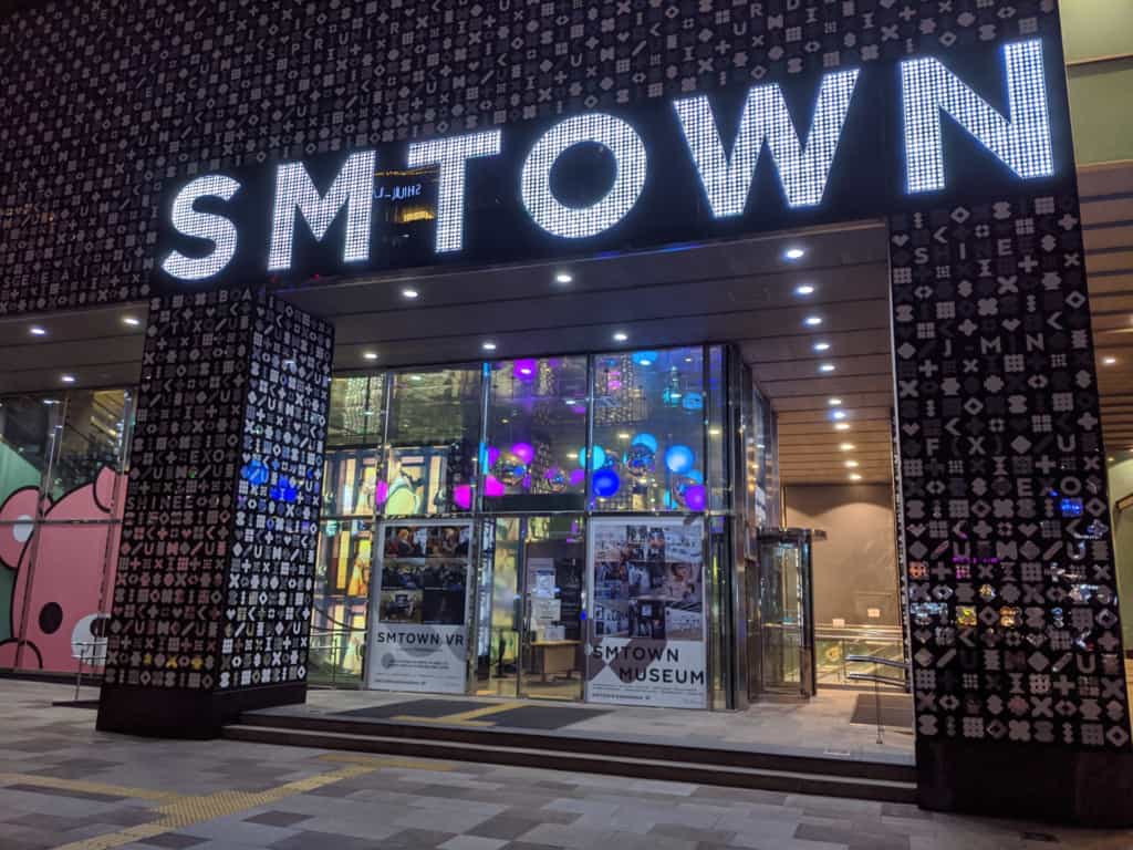 Outside the brightly lite SM Town Headquarters at Coex Artium