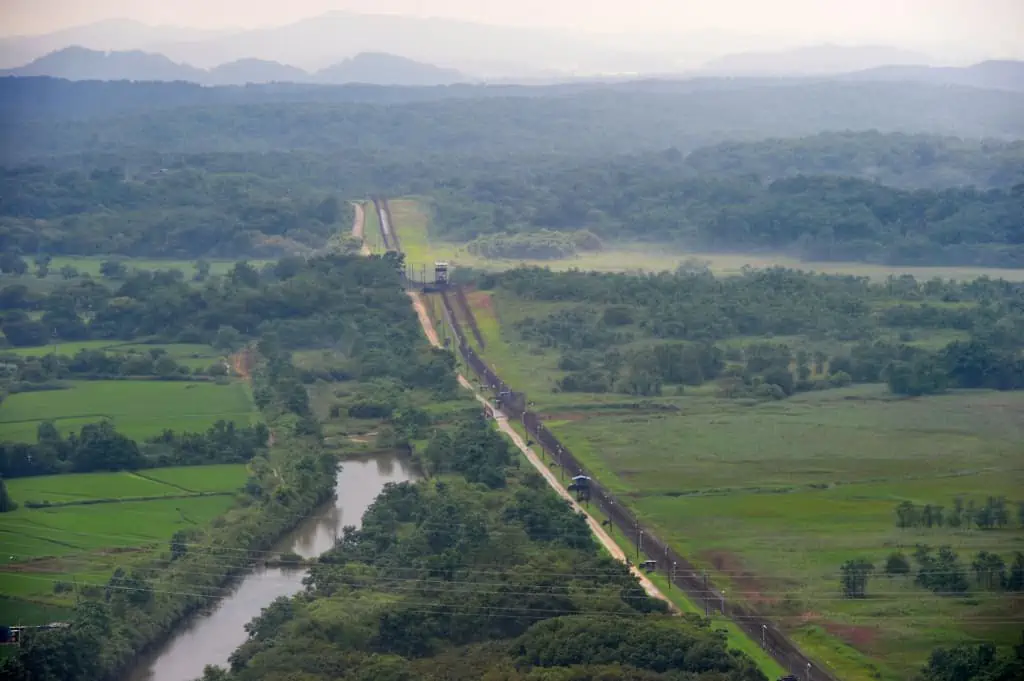 Nature flourishing inside the demilitarized zone with green grasses, trees and streams