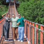 3 people taking a photo on the longest suspension bridge in South Korea